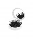 mirror with hairbrush