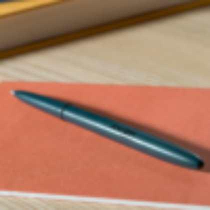 ELITE NAVY BLUE CERAKOTE ® BULLET SPACE PEN WITH AXIOM SPACE LOGO