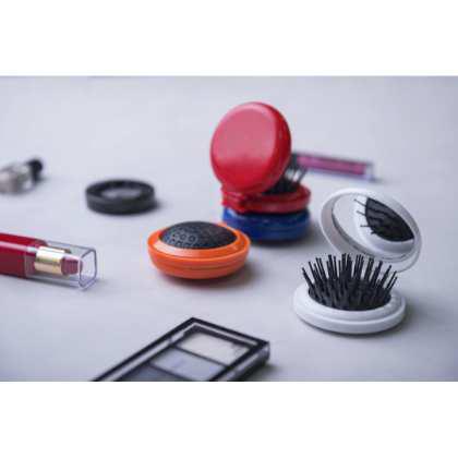 Hairbrush with Mirror Glance