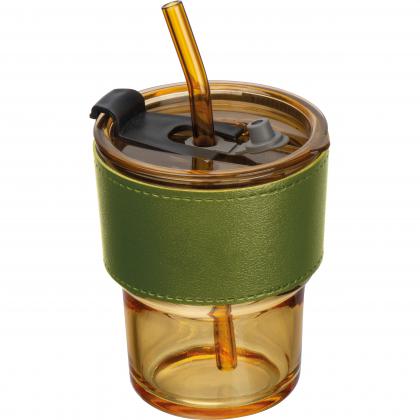Coloured drinking glass with glass straw