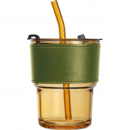 Coloured drinking glass with glass straw