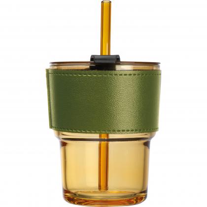 Coloured drinking glass with glass straw