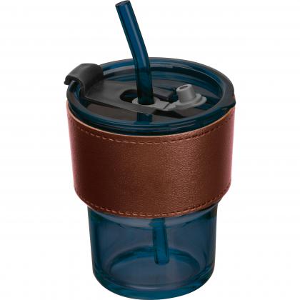 Coloured drinking glass with glass straw
