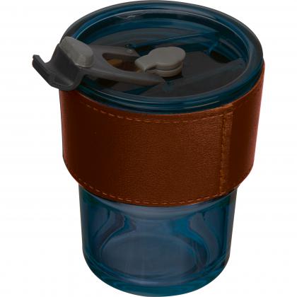 Coloured drinking glass with glass straw