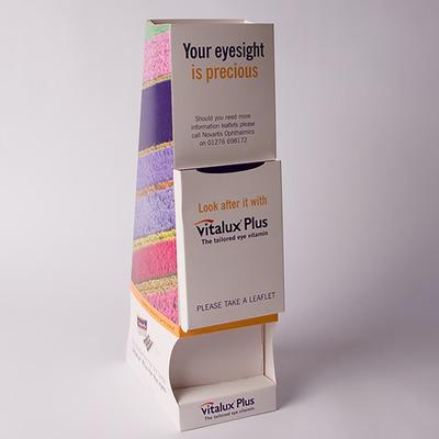 Drop Feed Product Dispenser With Leaflet Holder