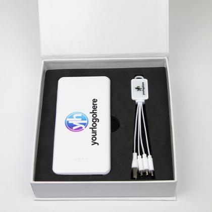 Power bank in a box, white colour, includes charging cable with multiple connectors, branding area on front, branded with your logo